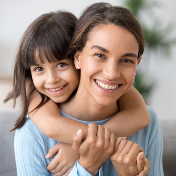 young sisters smiling