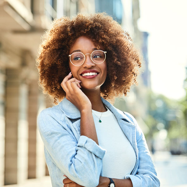 woman smiling outdoors